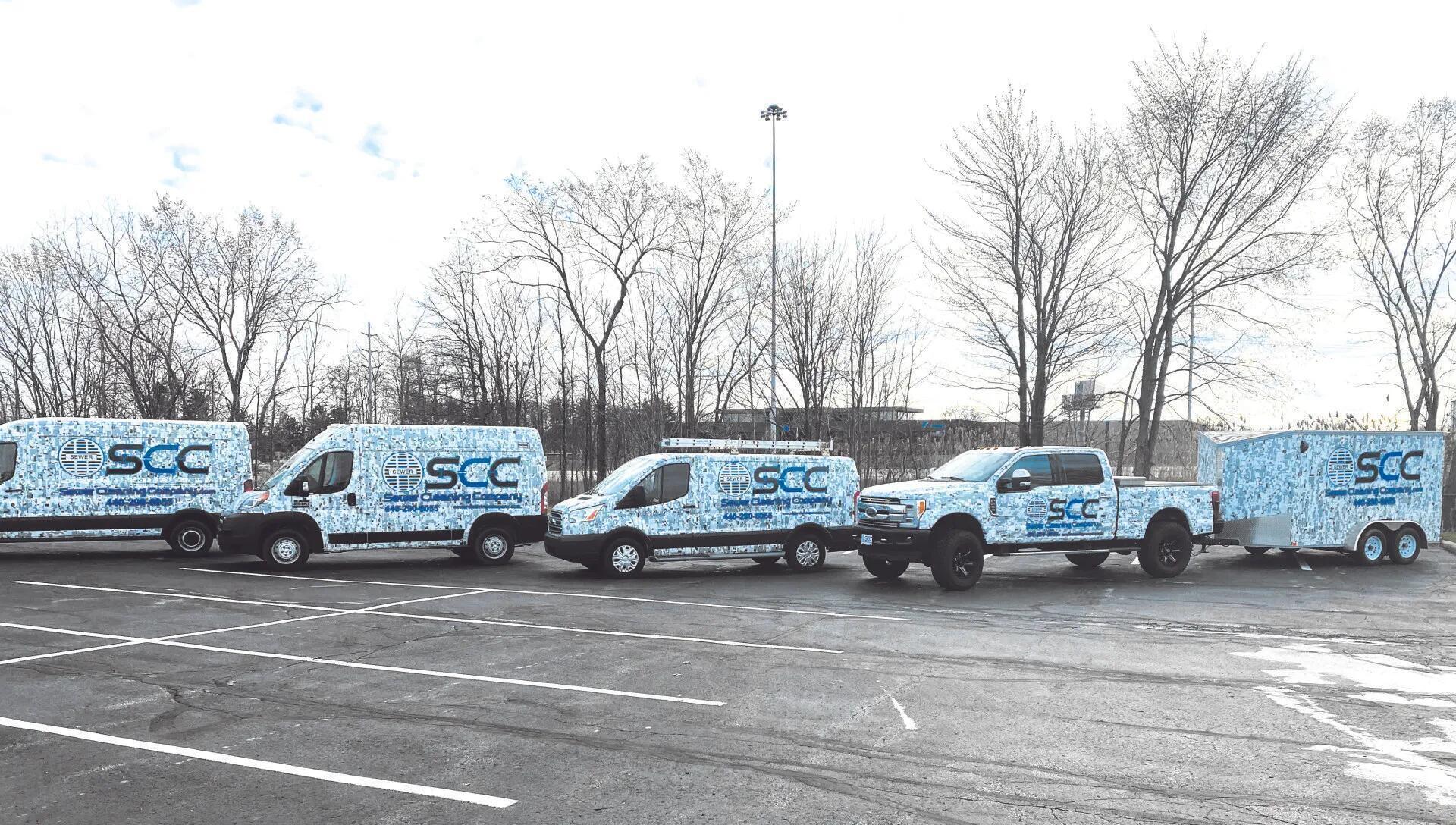 Fleet of work trucks from Sewer Cleaning Company, located in Cleveland, Ohio