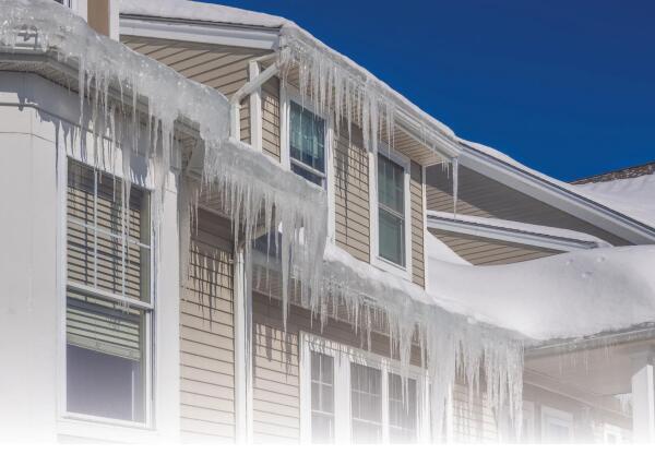 Icicles hanging from the exterior of a house