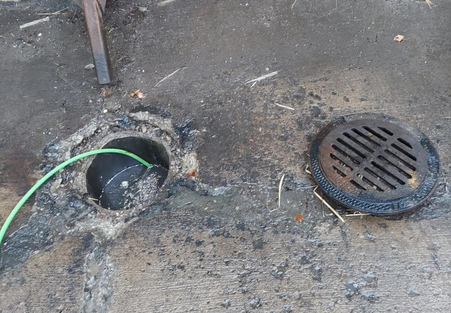 Storm drain being cleaned